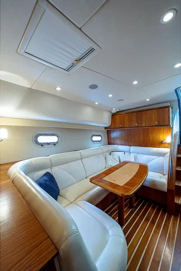 Second Chance II Yacht Photos Pics 2007 Tiara Yachts 4300 Sovran interior with elegant seating and wooden accents.