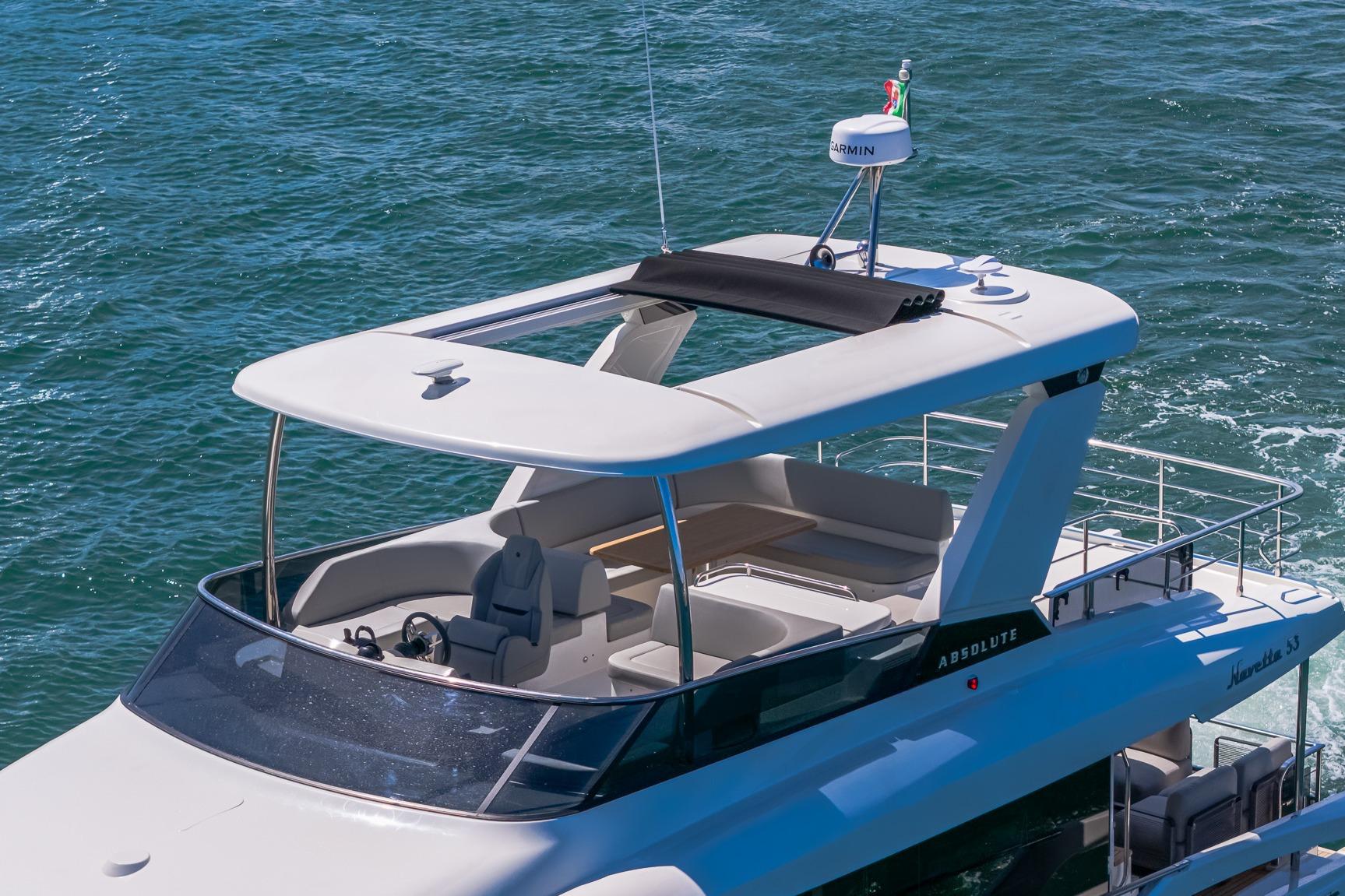 Luxury Absolute Navetta 53 yacht cruising on open water, 2026 model.