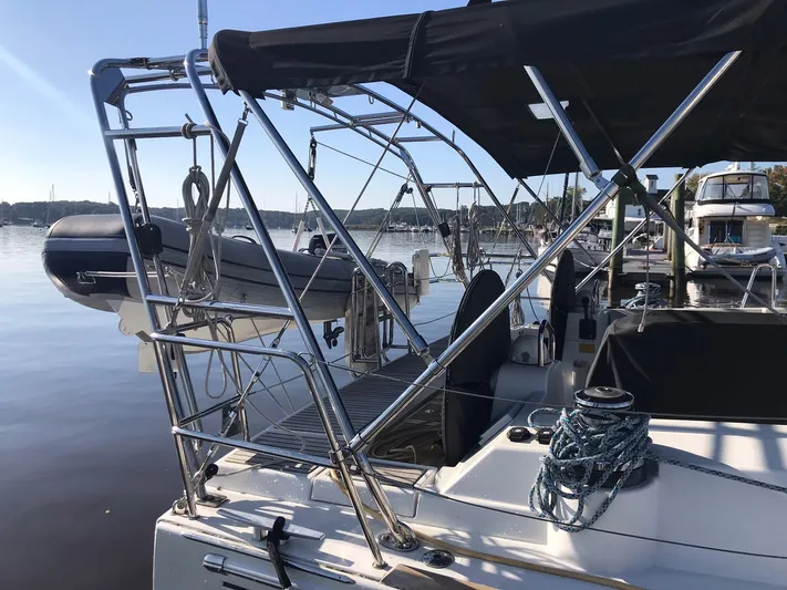 Jinbei Yacht Photos Pics 2014 Beneteau Oceanis 48 sailboat docked, featuring sleek design and modern rigging.
