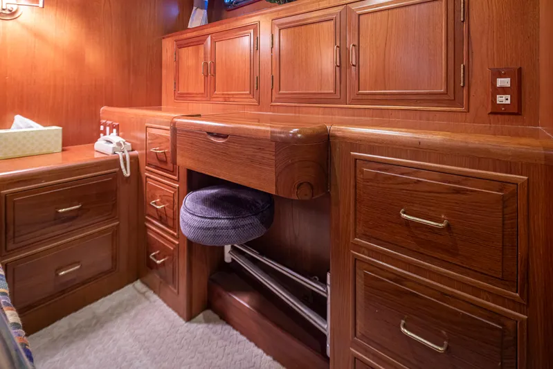Black Ice Yacht Photos Pics Luxurious wooden cabinetry in 1998 Ocean Alexander 64 yacht interior.