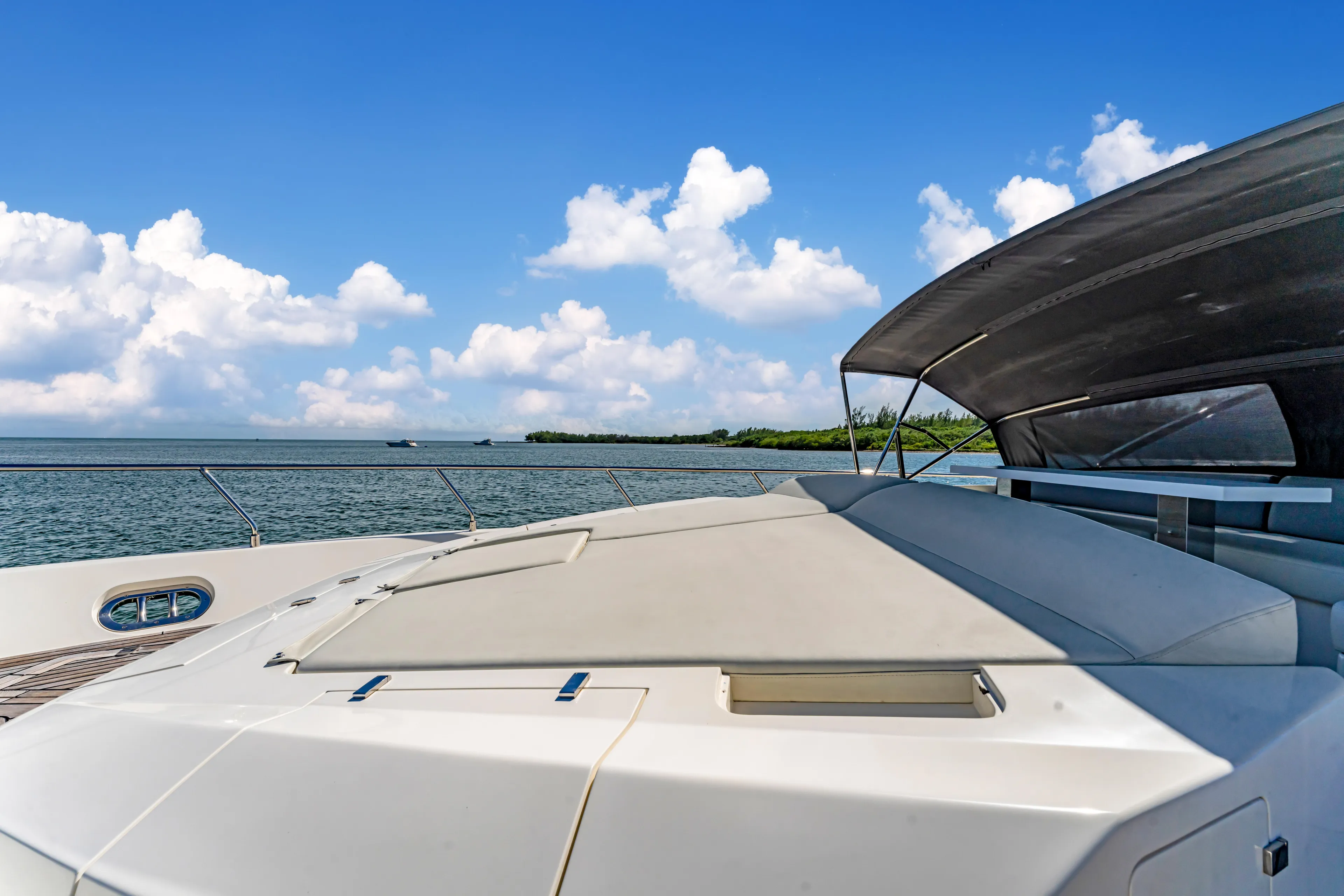 Seaduction Yacht Photos Pics Luxury Astondoa 80 GLX yacht deck, 2016 model, under clear blue sky.