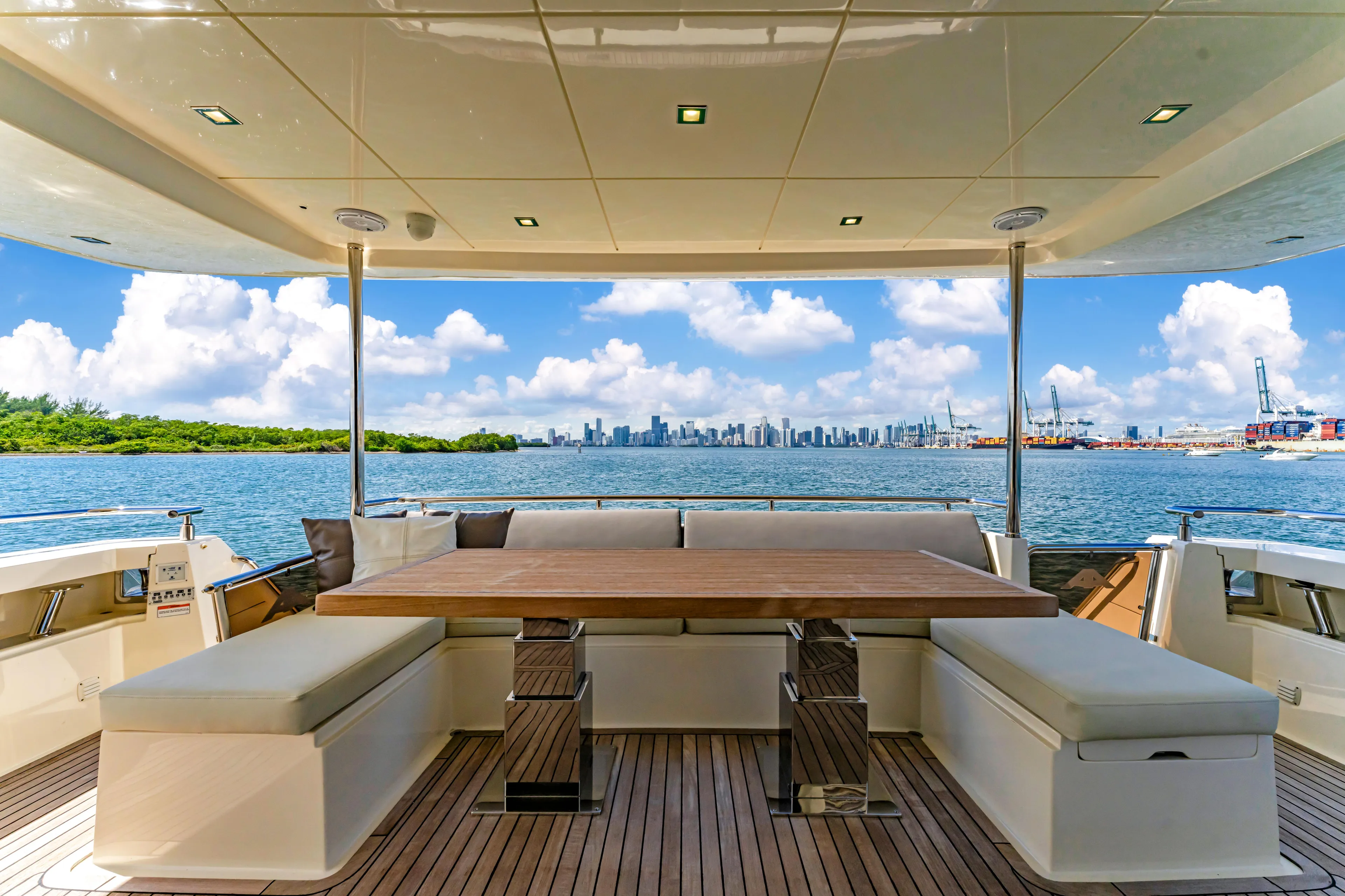 Seaduction Yacht Photos Pics Luxurious 2016 Astondoa 80 GLX yacht deck with city skyline view.