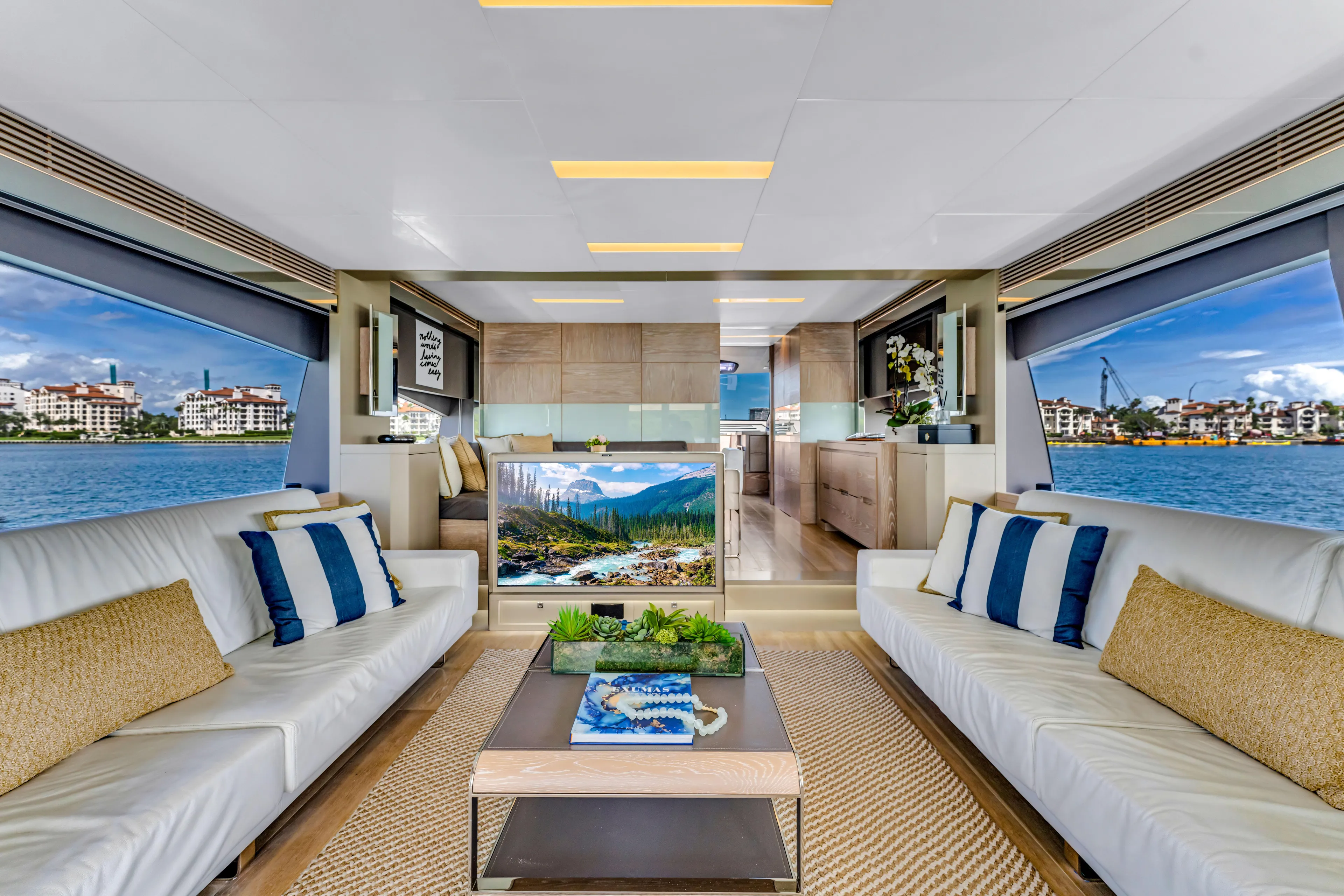 Seaduction Yacht Photos Pics Luxurious interior of 2016 Astondoa 80 GLX yacht with elegant seating and scenic views.