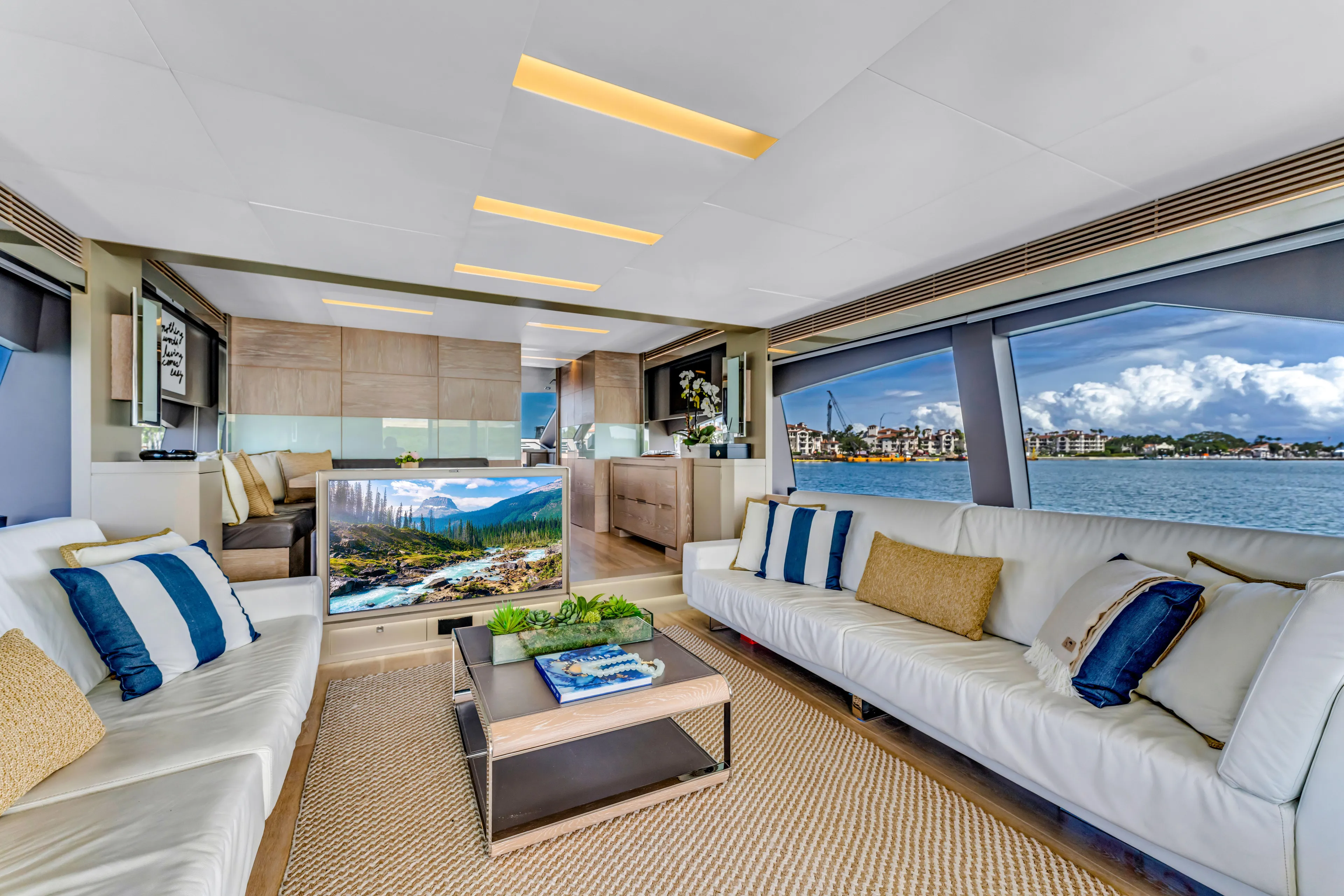 Seaduction Yacht Photos Pics Luxurious interior of 2016 Astondoa 80 GLX yacht with elegant seating and scenic views.