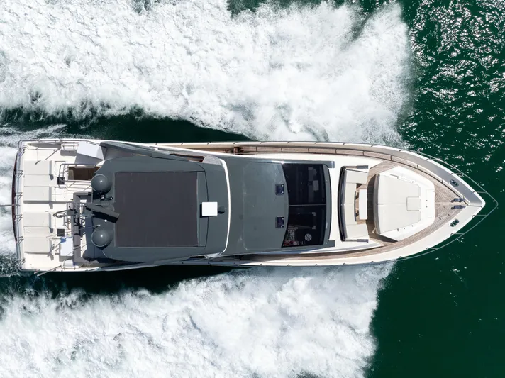 Seaduction Yacht Photos Pics Aerial view of 2016 Astondoa 80 GLX yacht cruising on the ocean.