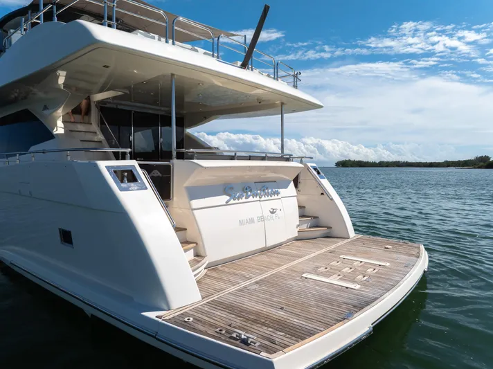 Seaduction Yacht Photos Pics Luxury Astondoa 80 GLX yacht, 2016 model, docked on serene water.