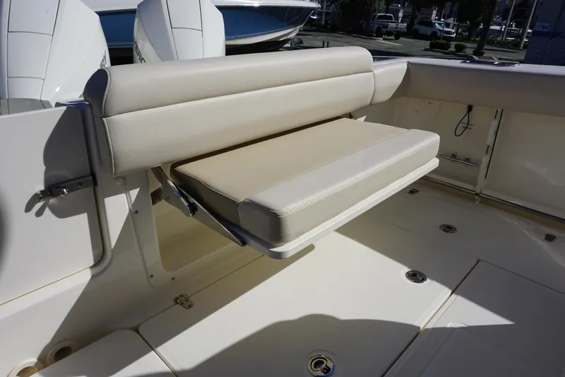 Bwce0767j324 Yacht Photos Pics 2024 Boston Whaler 250 Outrage boat with foldable bench seat in cockpit.