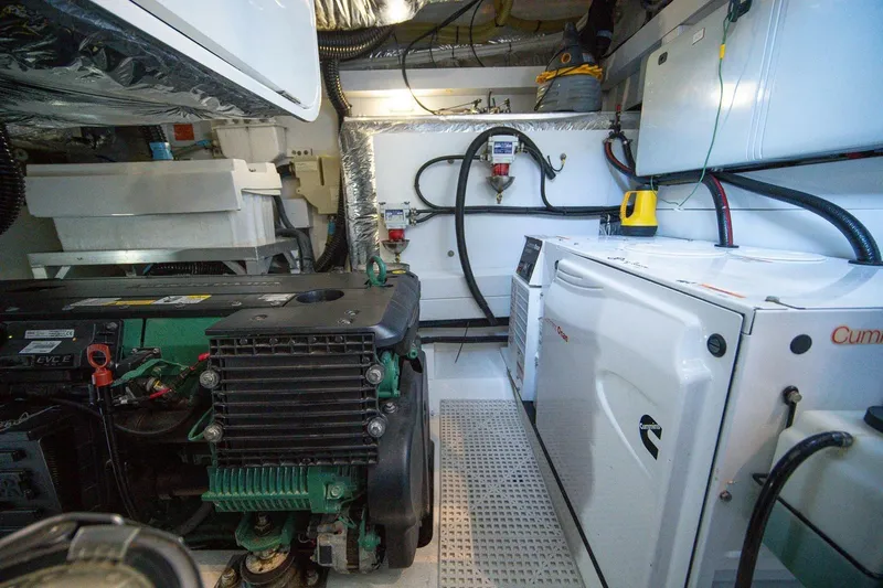 Sea-licious Yacht Photos Pics Engine room of a 2016 Princess V48 yacht, featuring machinery and equipment.