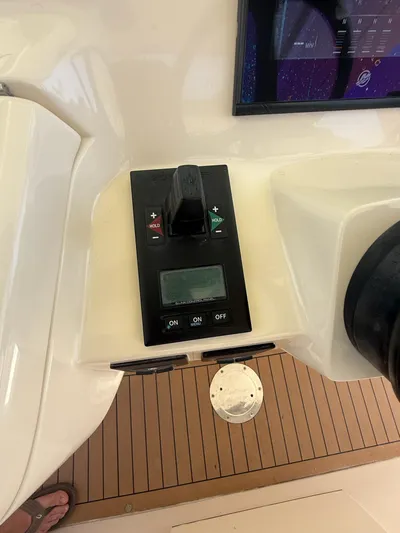 Reel Patience Yacht Photos Pics Control panel of a 2019 Scout 420 LXF boat with joystick and display.