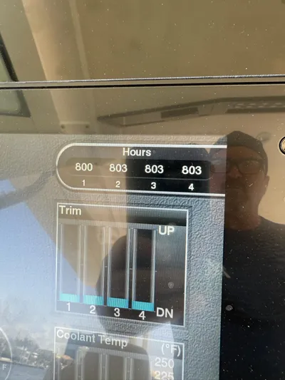 Reel Patience Yacht Photos Pics Display panel of 2019 Scout 420 LXF showing engine hours and trim levels.