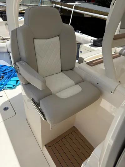 Reel Patience Yacht Photos Pics Luxurious seating on 2019 Scout 420 LXF boat with quilted upholstery.