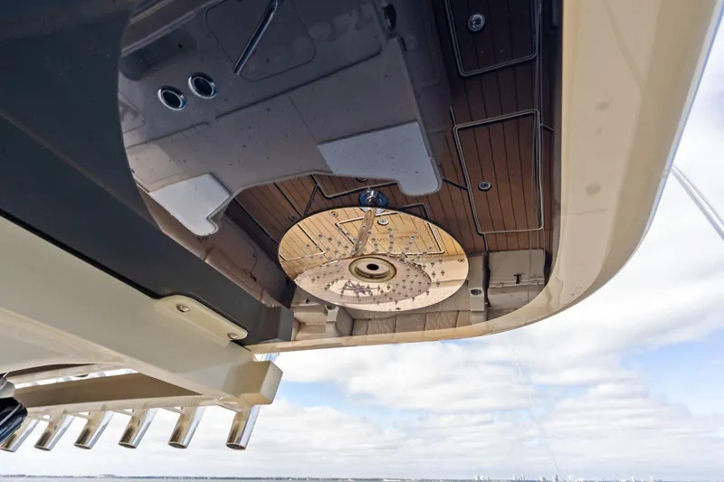 Off Line Yacht Photos Pics 2023 HCB 53 Suenos RXV boat ceiling with wood finish and lighting fixtures.