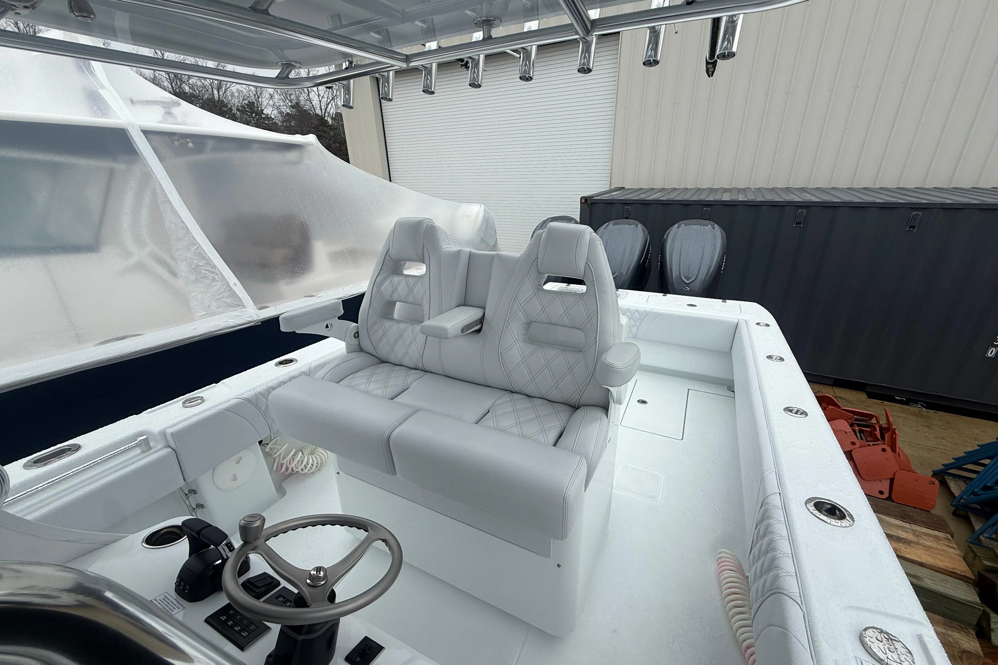 2026 Contender 35 ST boat interior with dual seats and steering console.