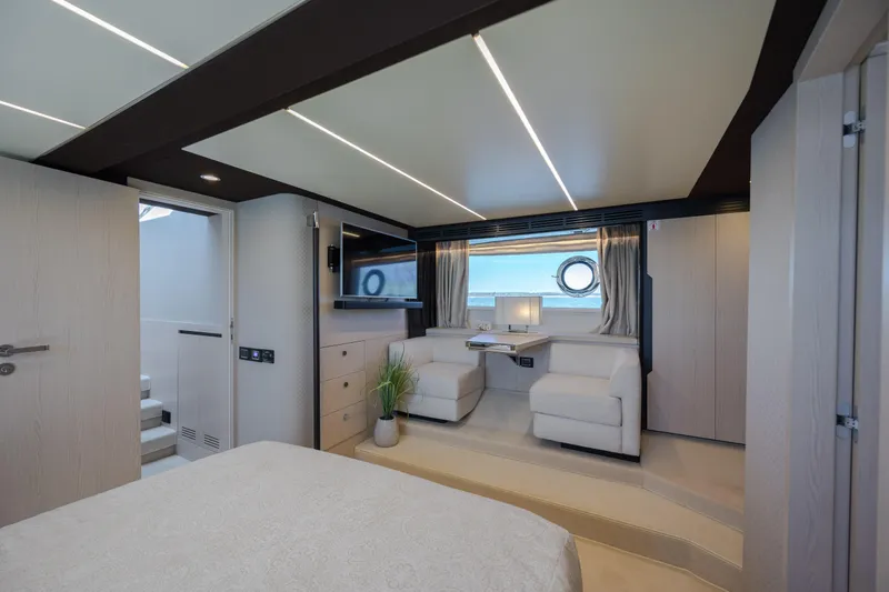  Yacht Photos Pics Luxurious interior of 2019 Azimut 66 FLY yacht with modern seating and elegant decor.
