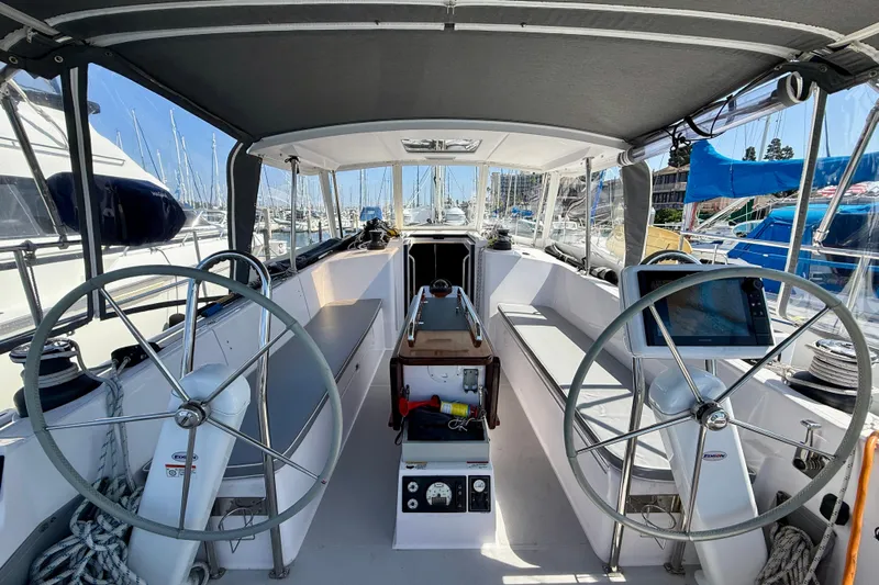 Nereid Yacht Photos Pics Cockpit of 2020 Catalina 425 sailboat with dual steering wheels and navigation equipment.