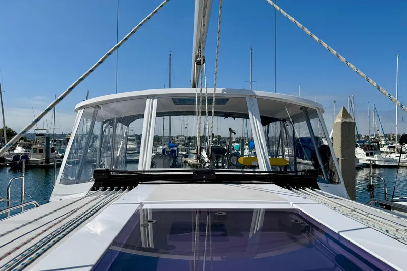 Nereid Yacht Photos Pics 2020 Catalina 425 sailboat docked in marina, showcasing sleek design and clear blue sky.