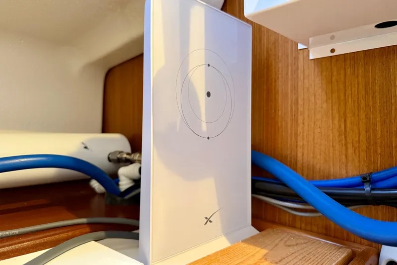 Nereid Yacht Photos Pics Starlink satellite internet setup inside a 2020 Catalina 425 yacht cabin.