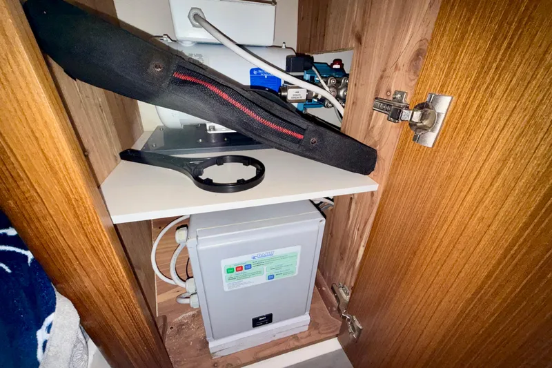 Nereid Yacht Photos Pics Inside a Catalina 425 cabinet, showcasing electrical components and wiring, 2020 model.