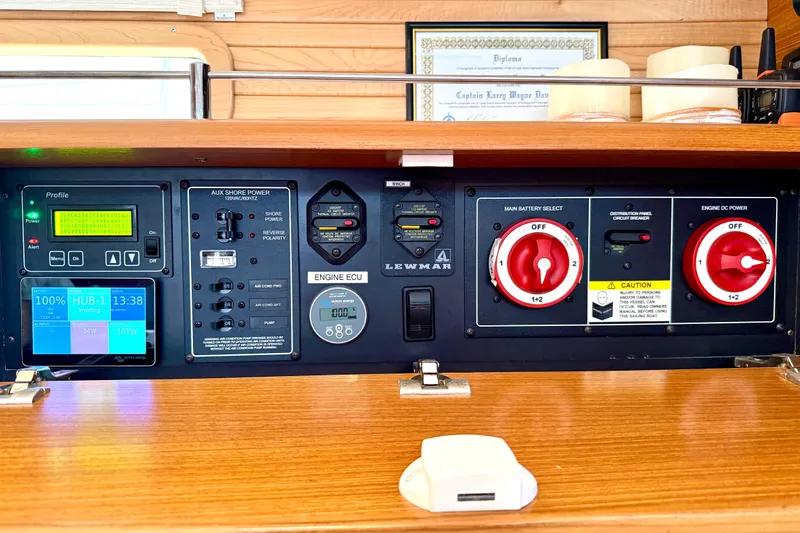 Nereid Yacht Photos Pics Control panel of a 2020 Catalina 425 yacht with various switches and displays.