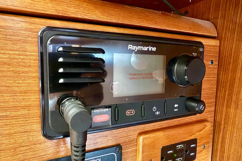 Nereid Yacht Photos Pics Raymarine marine radio system on 2020 Catalina 425 yacht, featuring control knobs and display.