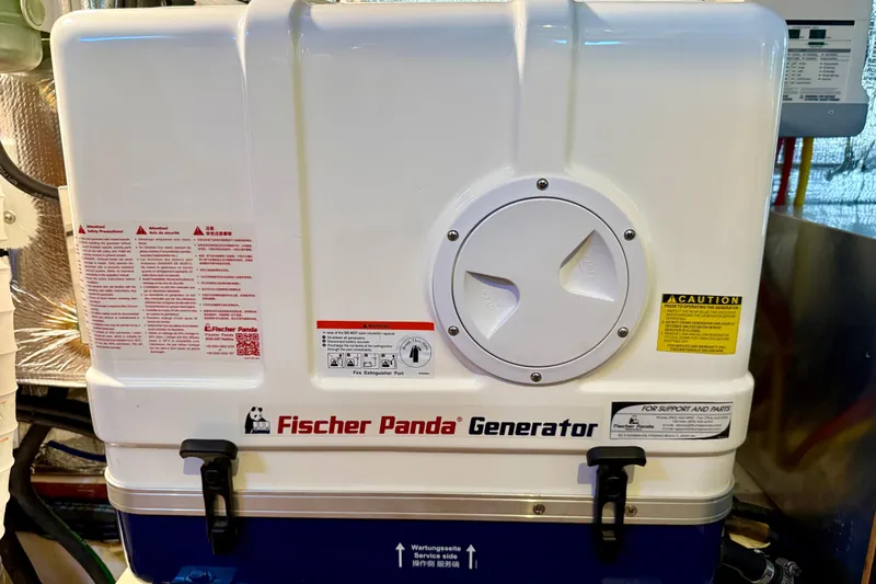 Nereid Yacht Photos Pics Fischer Panda generator on a 2020 Catalina 425 yacht, featuring safety instructions and caution labels.