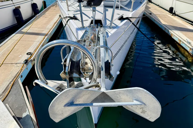 Nereid Yacht Photos Pics Bow view of a 2020 Catalina 425 sailboat docked, featuring anchor and deck details.