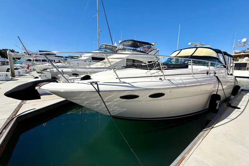 The Office Yacht Photos Pics 2003 Sea Ray 380 Sundancer docked at marina under clear blue sky.