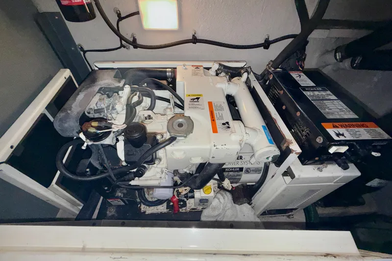 The Office Yacht Photos Pics Engine compartment of a 2003 Sea Ray 380 Sundancer with Kohler power system.
