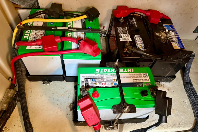 The Office Yacht Photos Pics Batteries in a 2003 Sea Ray 380 Sundancer boat engine compartment.