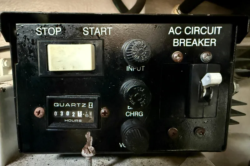 The Office Yacht Photos Pics Control panel of a 2003 Sea Ray 380 Sundancer boat with hour meter and circuit breaker.