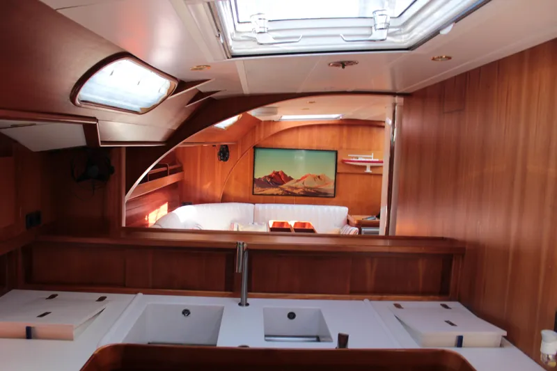 Heidenskip Yacht Photos Pics Interior of 2005 Custom Keel Cutter Rigged Sloop with wooden finish and skylight.