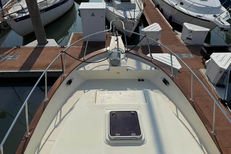 Raven Song Yacht Photos Pics 2011 North Pacific 38 Sedan yacht docked at marina, view from bow.