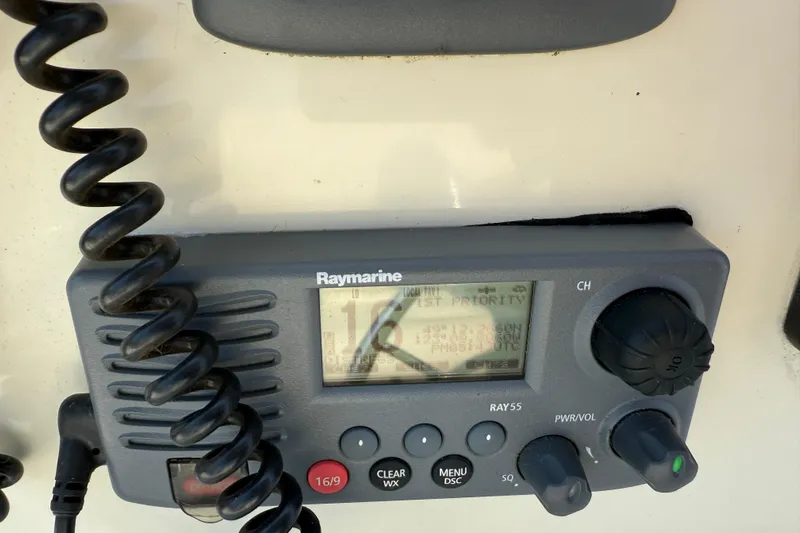 Raven Song Yacht Photos Pics Raymarine marine radio on 2011 North Pacific 38 Sedan boat dashboard.