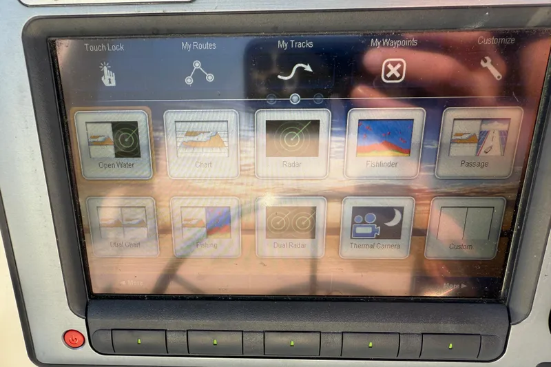 Raven Song Yacht Photos Pics Touchscreen navigation system on a 2011 North Pacific 38 Sedan boat.