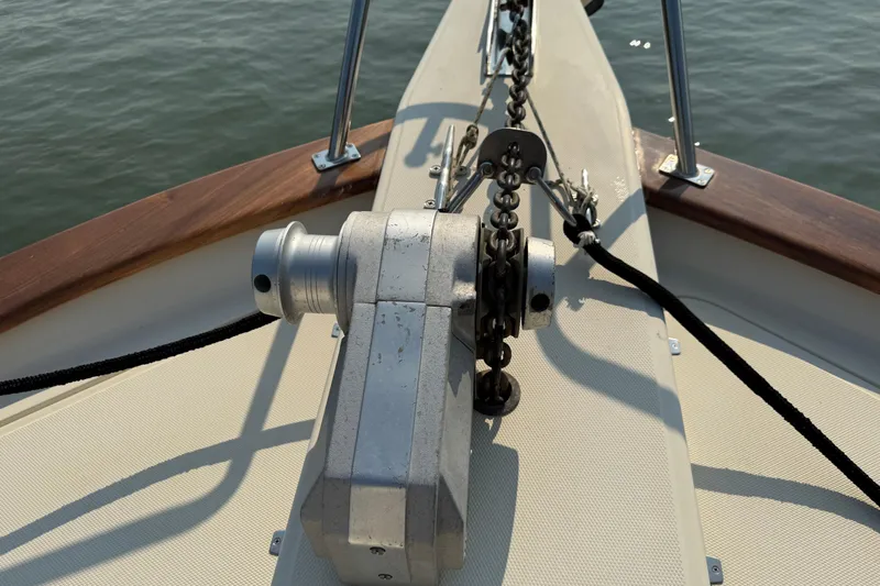 Raven Song Yacht Photos Pics Bow of 2011 North Pacific 38 Sedan with anchor chain and winch.