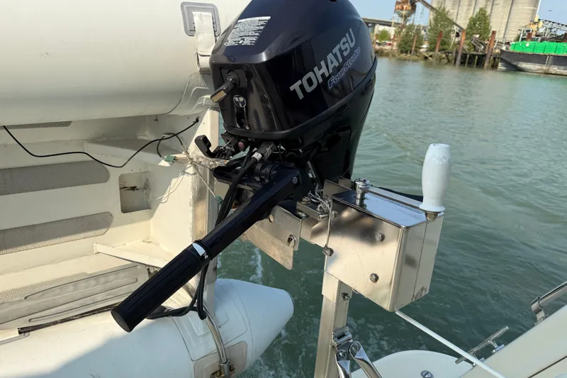 Raven Song Yacht Photos Pics Tohatsu outboard motor on a 2011 North Pacific 38 Sedan boat.