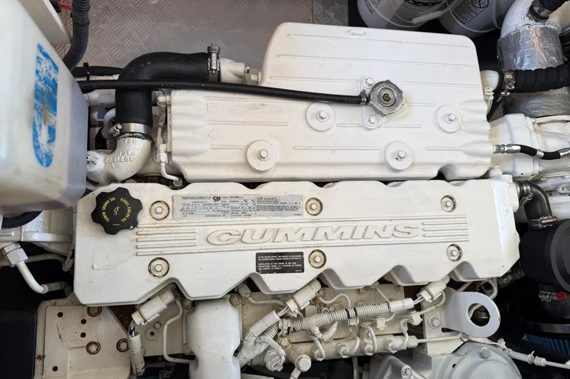 Raven Song Yacht Photos Pics Cummins engine in a 2011 North Pacific 38 Sedan boat, showcasing detailed components.