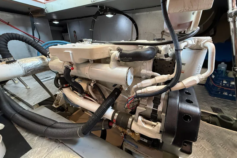 Raven Song Yacht Photos Pics Engine room of a 2011 North Pacific 38 Sedan, showcasing detailed mechanical components.