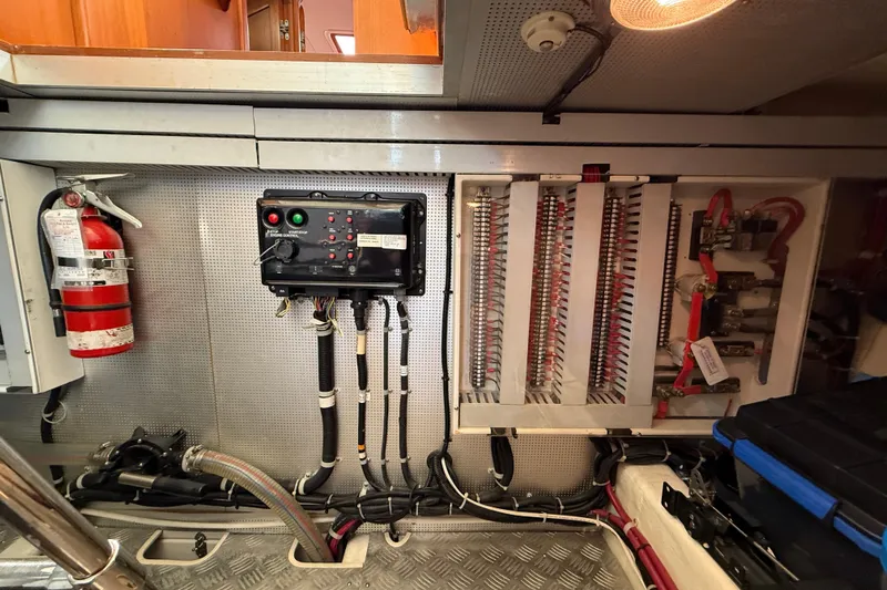 Raven Song Yacht Photos Pics Electrical panel and fire extinguisher in 2011 North Pacific 38 Sedan boat.