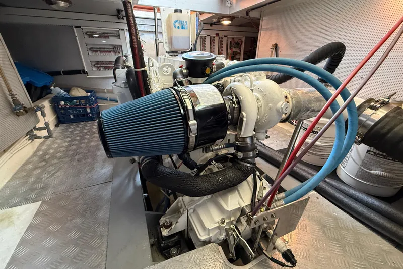 Raven Song Yacht Photos Pics Engine room of a 2011 North Pacific 38 Sedan with visible components and wiring.