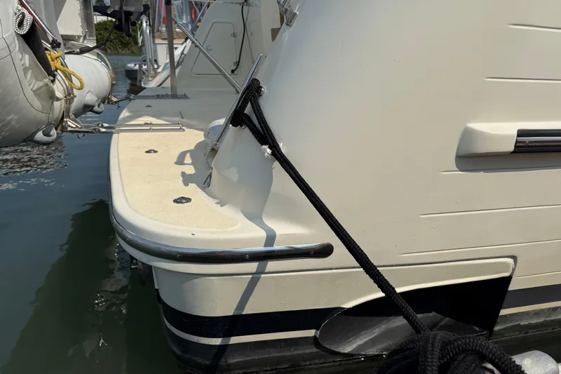 Raven Song Yacht Photos Pics 2011 North Pacific 38 Sedan yacht docked with rope, featuring sleek design and sturdy build.