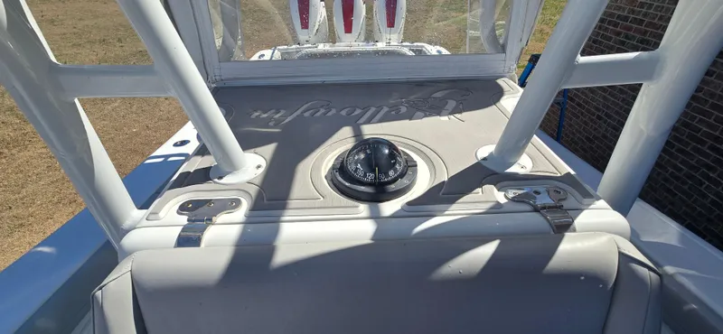  Yacht Photos Pics 2017 Yellowfin 36 boat console with compass and sturdy framework.