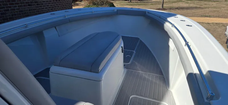  Yacht Photos Pics 2017 Yellowfin 36 boat interior with cushioned seating and sleek design.