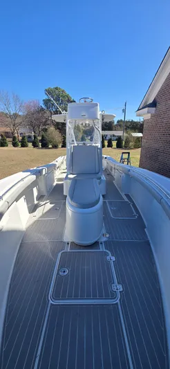  Yacht Photos Pics 2017 Yellowfin 36 boat with sleek deck design under clear blue sky.