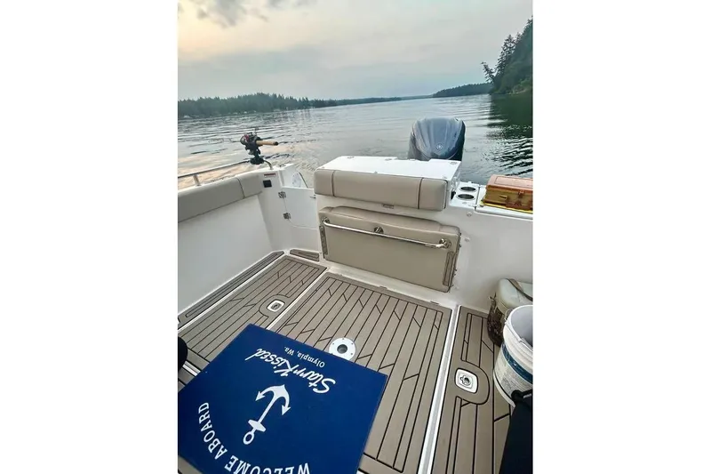  Yacht Photos Pics 2025 Cutwater C-248 Coupe boat interior with scenic lake view.