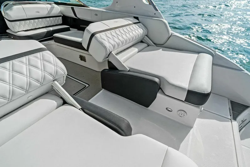  Yacht Photos Pics Luxurious seating on 2023 Regal 29 OBX boat with quilted upholstery, ocean view.