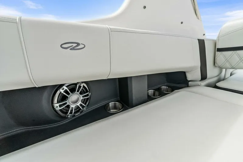  Yacht Photos Pics 2023 Regal 29 OBX boat interior with speaker and cup holders.