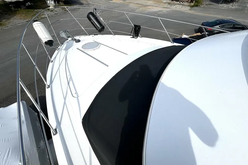  Yacht Photos Pics 2003 Carver 396 Motor Yacht deck view with railings and equipment.