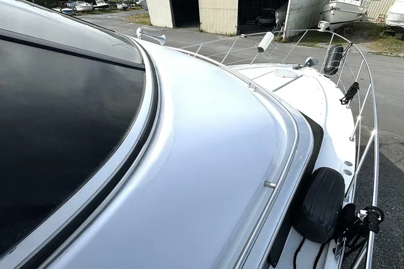  Yacht Photos Pics 2003 Carver 396 Motor Yacht deck view with sleek design and docked setting.