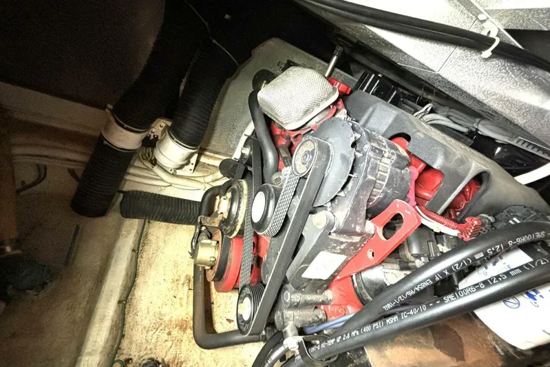  Yacht Photos Pics Engine compartment of a 2003 Carver 396 Motor Yacht, showing belts and hoses.